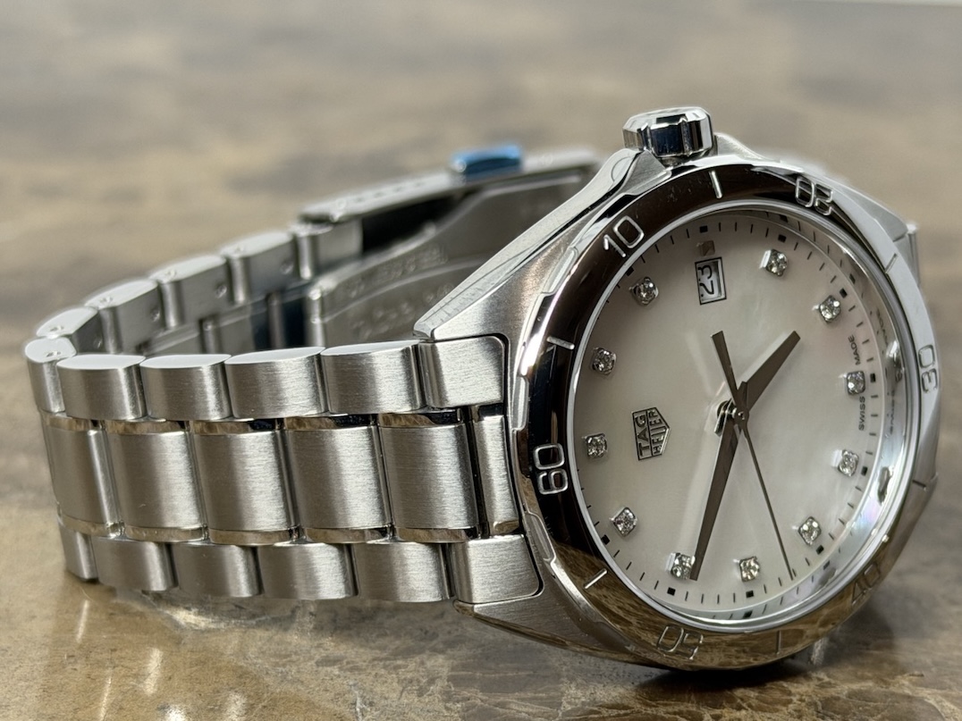 Tag Heuer Formula One quartz 35mm midsize Mother of Pearl Diamond Dial with box and papers WBJ1319 never worn