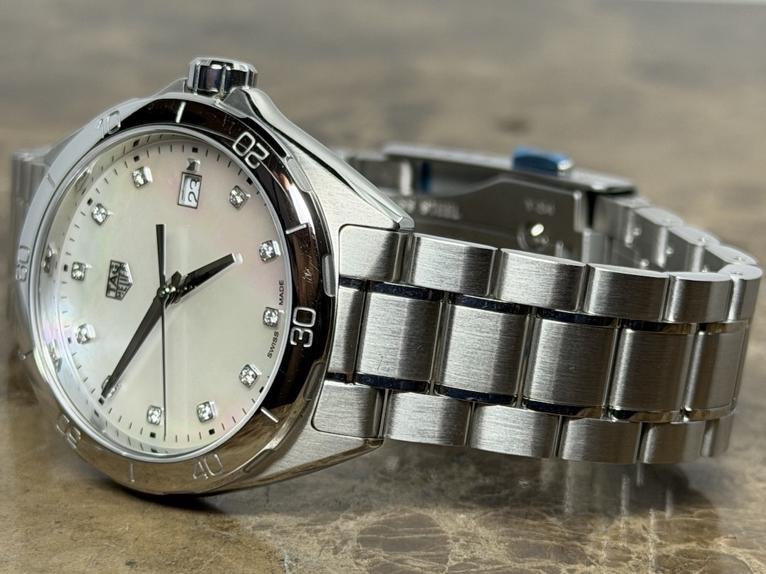 Tag Heuer Formula One quartz 35mm midsize Mother of Pearl Diamond Dial with box and papers WBJ1319 never worn