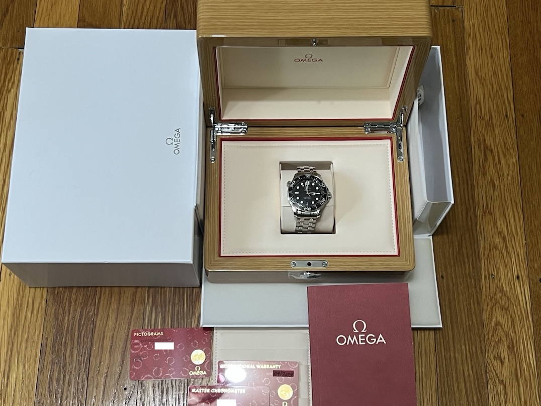 Omega Seamaster Diver 300M Co‑Axial Master Chronometer 42mm Black Dial Black Ceramic Bezel Box Papers Cards model 210.30.42.20.01.001