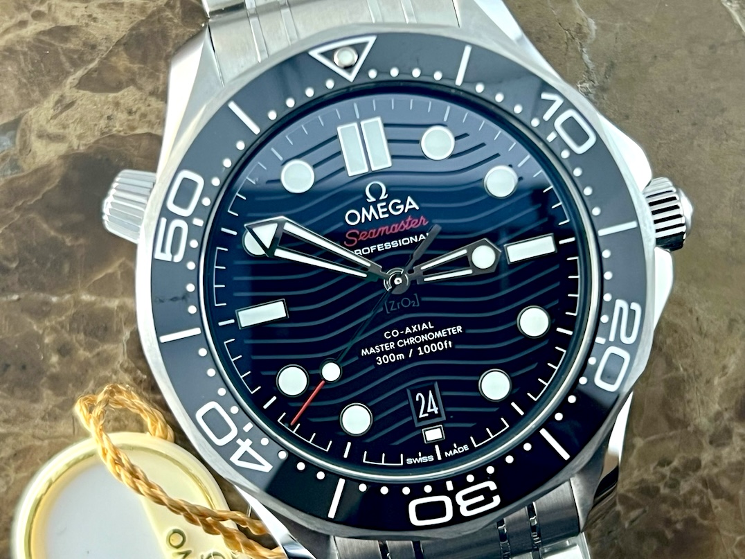 Omega Seamaster Diver 300M Co‑Axial Master Chronometer 42mm Black Dial Black Ceramic Bezel Box Papers Cards model 210.30.42.20.01.001