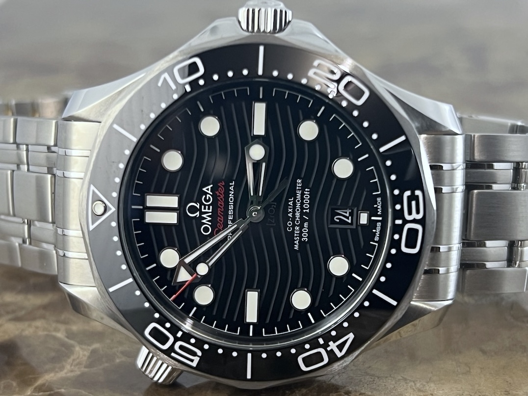 Omega Seamaster Diver 300M Co‑Axial Master Chronometer 42mm Black Dial Black Ceramic Bezel Box Papers Cards model 210.30.42.20.01.001