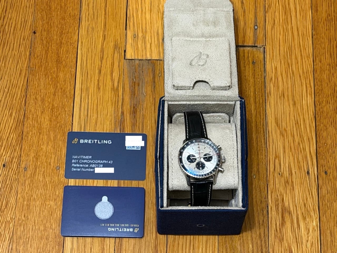 BREITLING Navitimer B01 Chronograph 43 Automatic Silver Black with Box Papers Card AB0138241G1P1 Never Worn