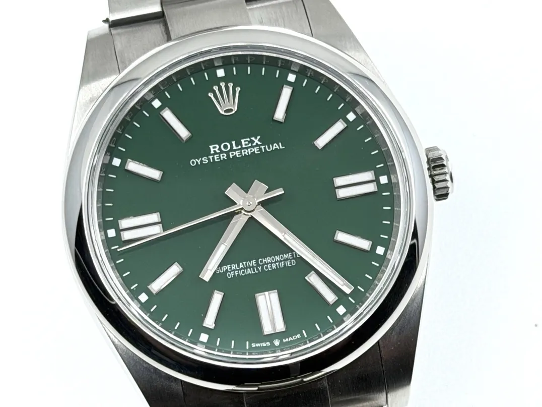 Rolex Oyster Perpetual 41 with Green Dial model 124300 Box Papers Card