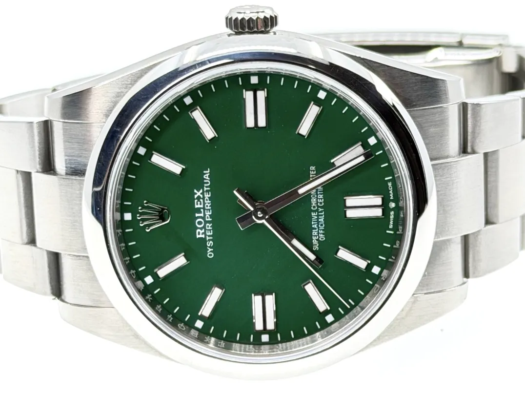 Rolex Oyster Perpetual 41 with Green Dial model 124300 Box Papers Card
