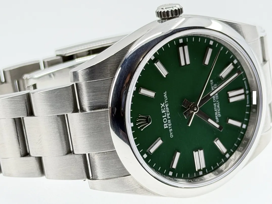 Rolex Oyster Perpetual 41 with Green Dial model 124300 Box Papers Card