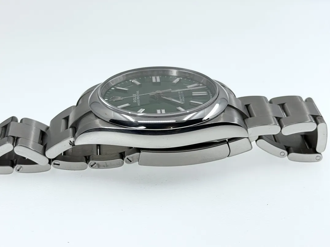 Rolex Oyster Perpetual 41 with Green Dial model 124300 Box Papers Card