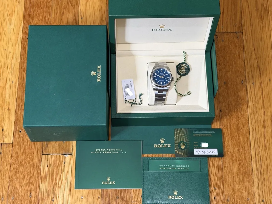 Rolex Oyster Perpetual 41 with Med Blue Dial model 134300 Box Papers Card Year 2025
