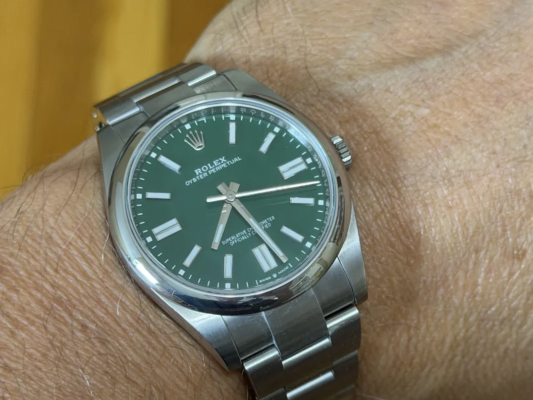 Rolex Oyster Perpetual 41 with Green Dial model 124300 Box Papers Card