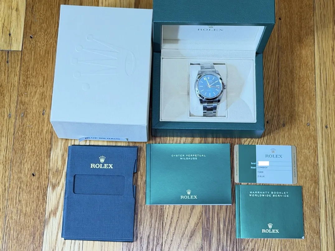 Rolex MilGauss with Blue Dial Green Crystal 40mm Automatic Box Papers Card 116400GV