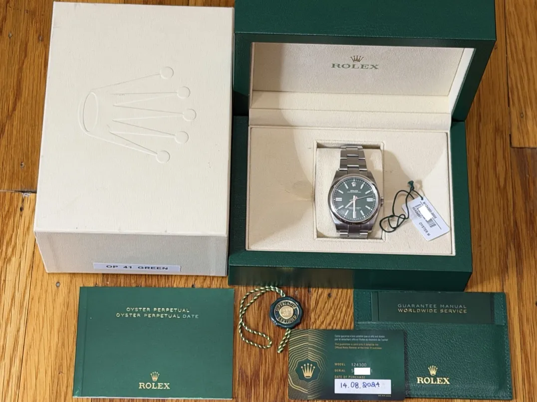 Rolex Oyster Perpetual 41 with Green Dial model 124300 Box Papers Card